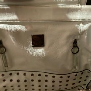 Hand bag ( MICHE LUKE it’s a light baby blue bag